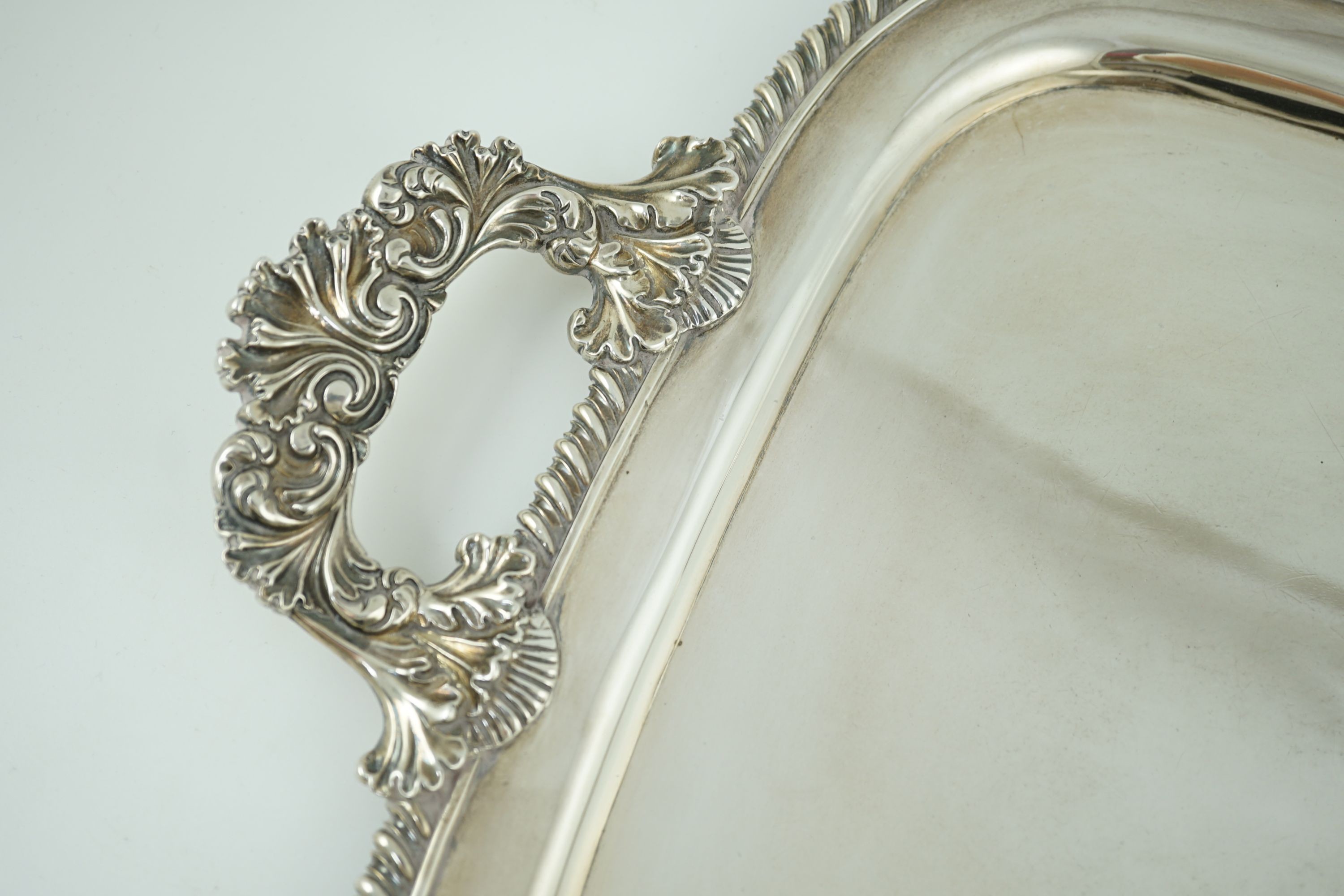 A George IV silver two-handled rounded rectangular tea tray, by The Barnards